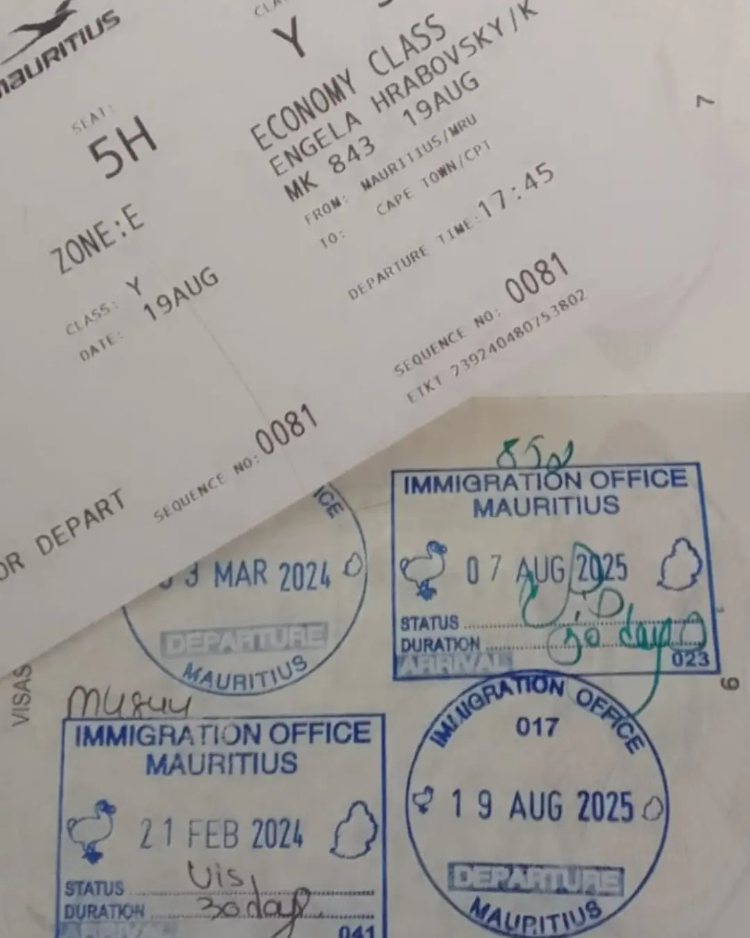 Passport stamps and boarding pass showing Mauritius visa free travel for South Africans up to 90 days