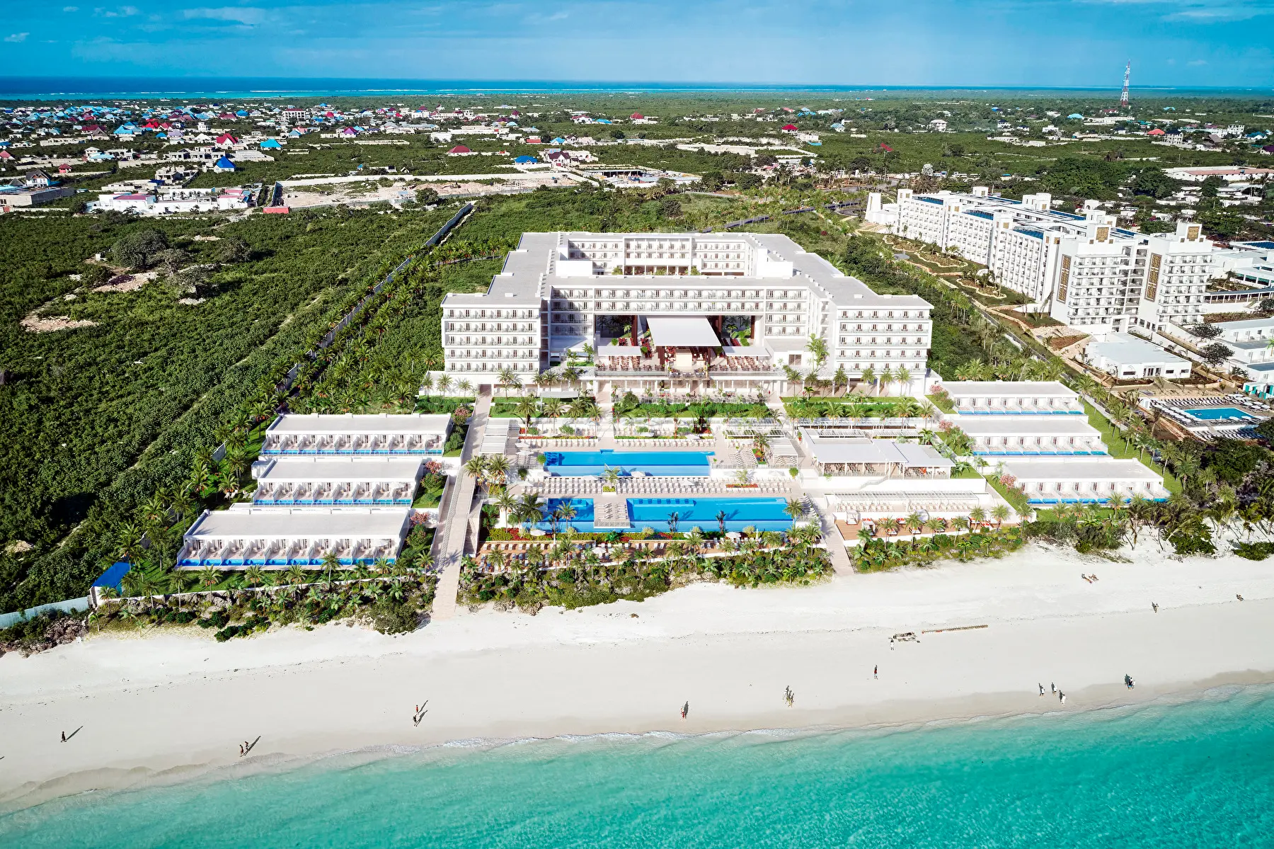 Aerial view of Riu Palace Swahili resort on white sand beach