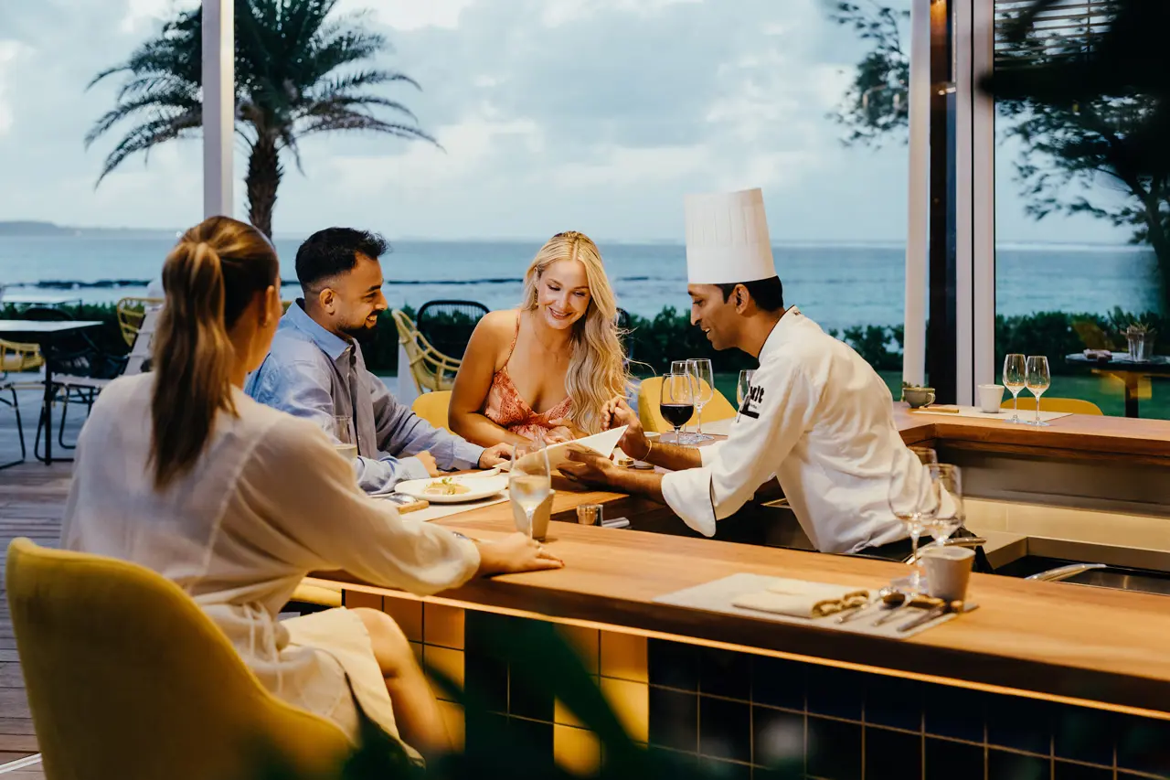 Chef speaking to guests at Tek Tek Restaurant at SALT of Palmar Mauritius